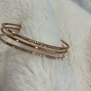 Rose colored bracelet with cubic zirconia diamonds. Stunning little bracelet